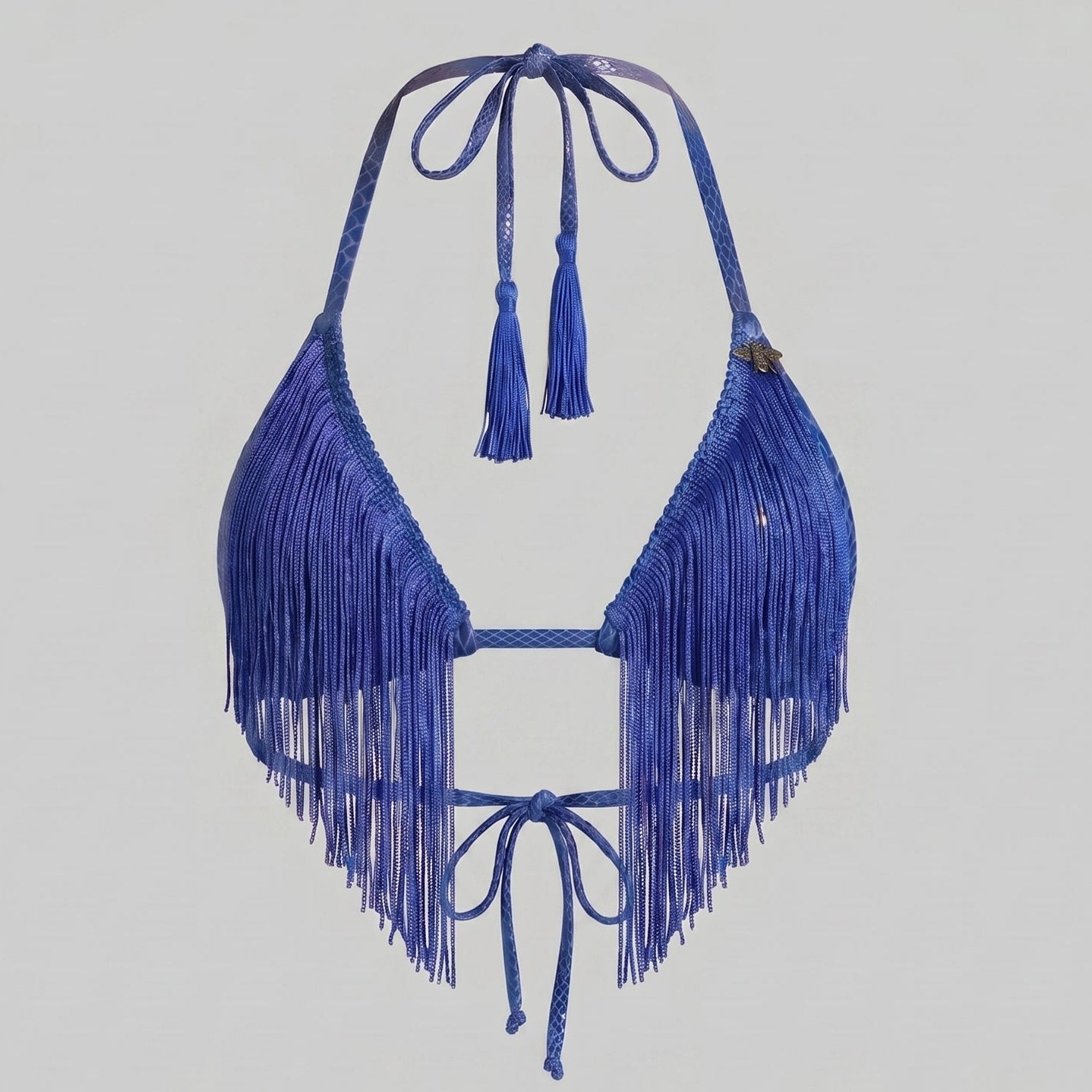 Blue fringe bikini top on a gray background
