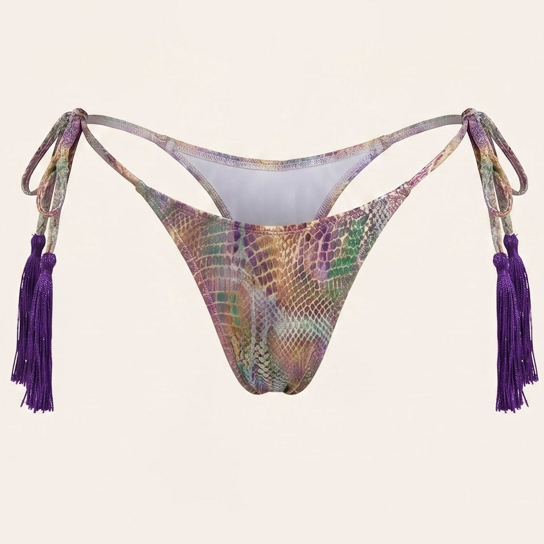 Purple fringe bikini set on a light beige background